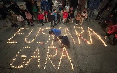 Korrikaren lema kandelen argiekin piztu dute Amurrion